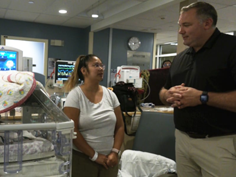 Barrie mayor hands out Boots and Hearts Barn Burner tickets to NICU families at RVH 