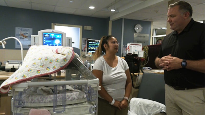 Barrie mayor hands out Boots and Hearts Barn Burner tickets to NICU families at RVH 