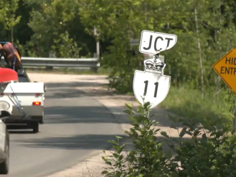 Highway 11 partially reopens after transport crash